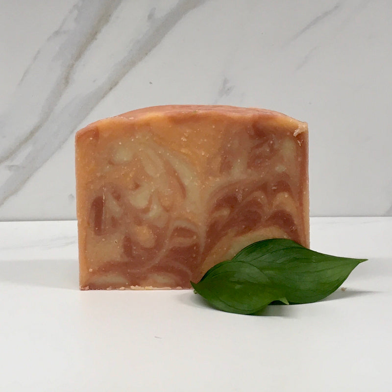 Orange, red and tan bar of soap